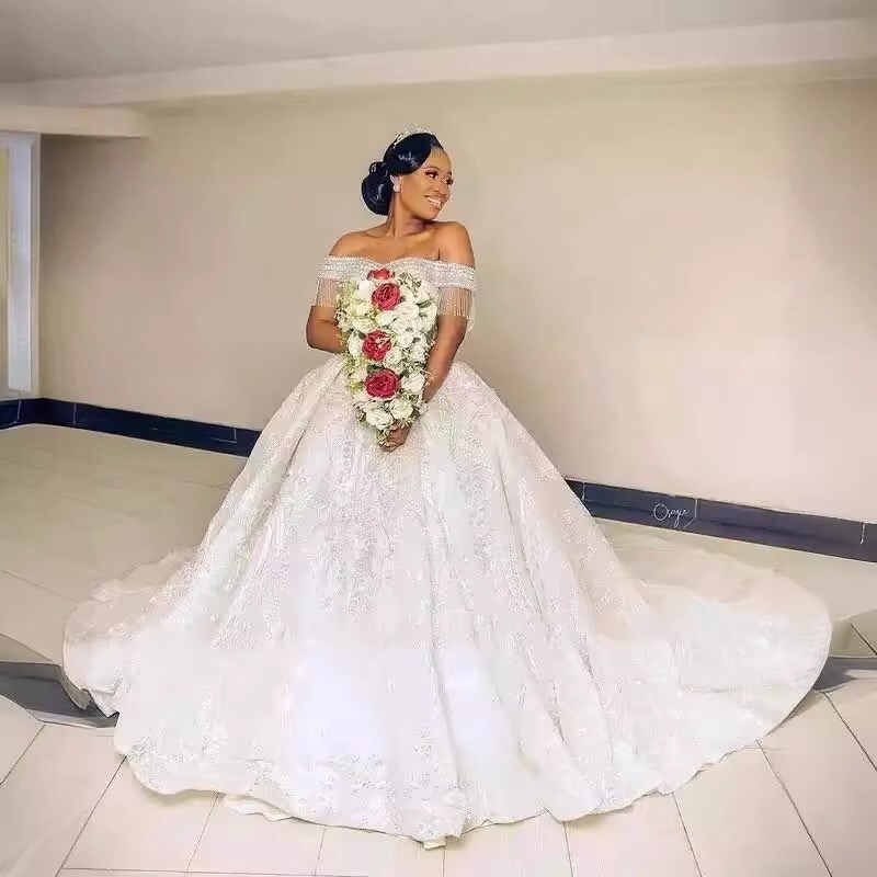 beaded fringe off shoulder wedding gown chapel train