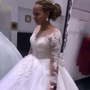 illusion long sleeve lace applique ball gown wedding dress