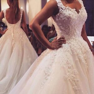 pearl beaded lace ball gown wedding dress