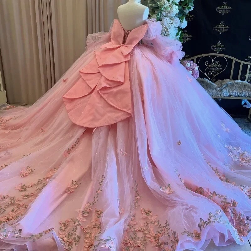 pink-lace-up-corset-back-quinceanera-ball-gown-with-oversized-back-bow-glitter-tulle-skirt-butterfly-applique-and-chapel-train